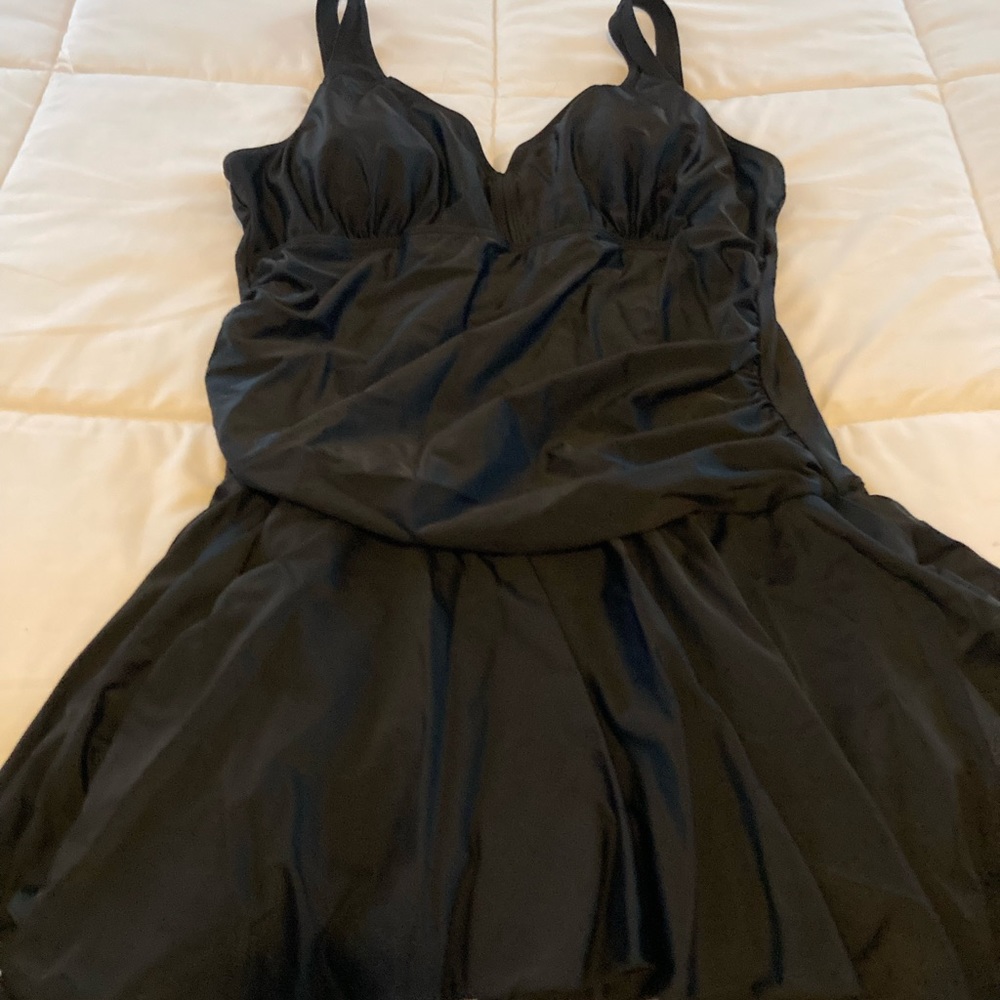 Women’s black swimsuit, worn once and carefully washed. Very flattering elegant